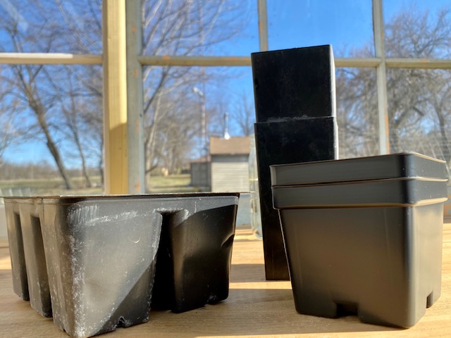tools and supplies for seed starting, pots and containers