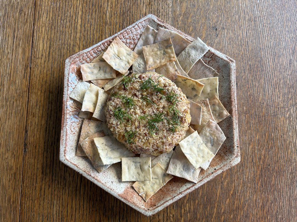 homemade cheese ball with homemade rosemary crackers